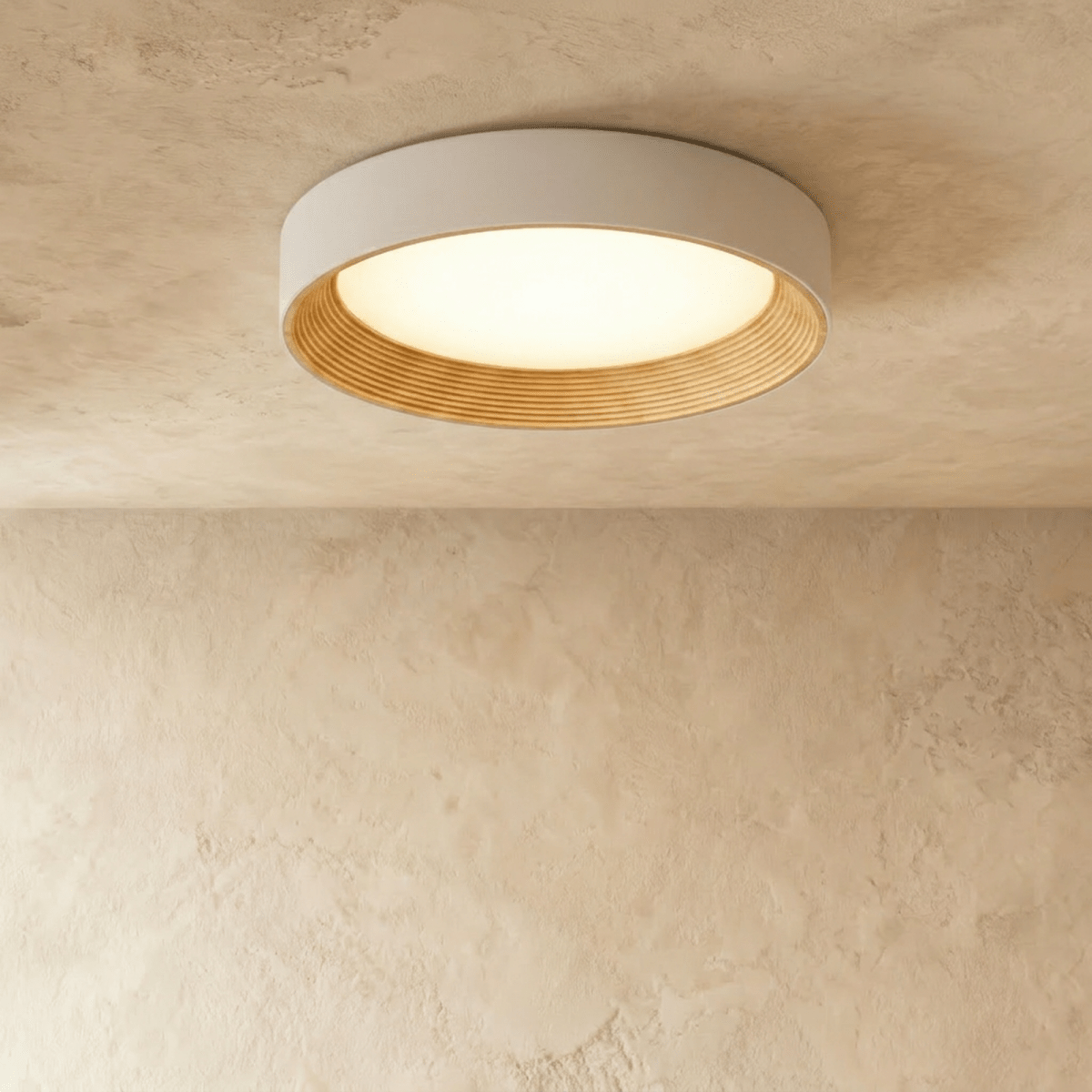 Round ceiling light fixture with white and natural wood finish on neutral background, viewed from below.
